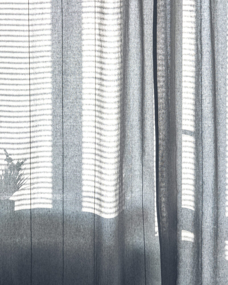 Room interior with curtains and blinds in sunny weather, shine the shadows.